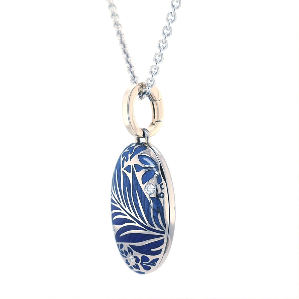Oval pendant in white gold, with blue color and diamonds.