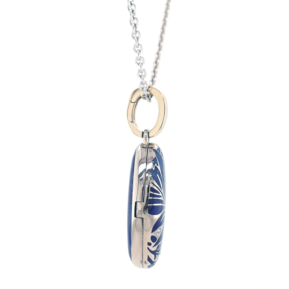 Oval pendant in white gold, with blue color and diamonds.