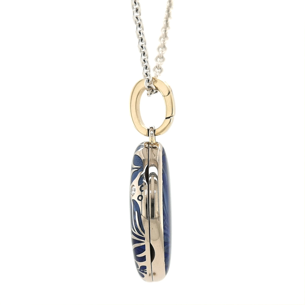 Oval pendant in white gold, with blue color and diamonds.