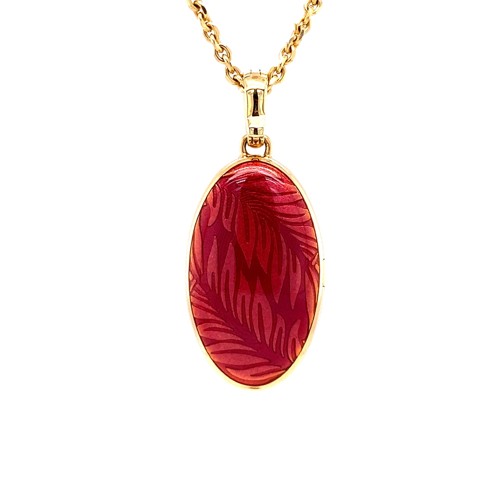 Ovaler Anhänger aus Gelbgold mit roter Farbe und Brillanten.