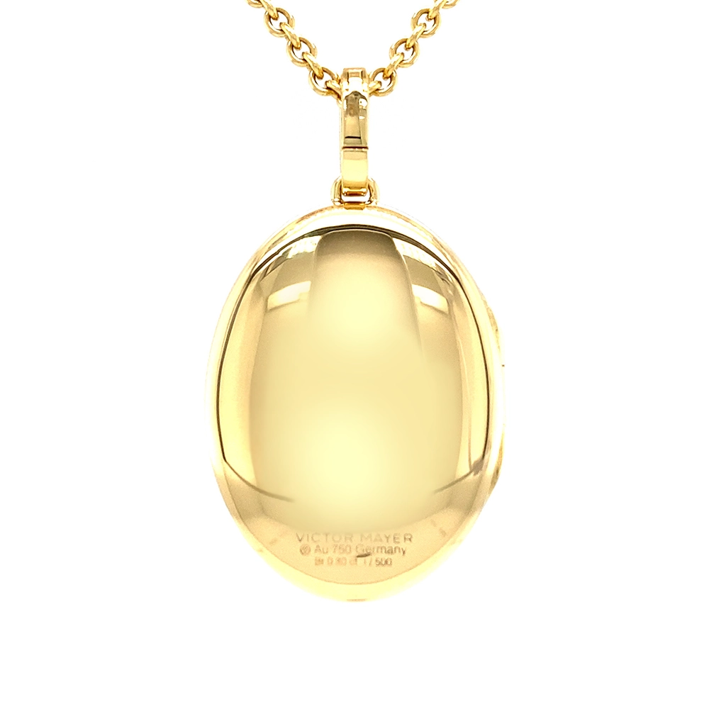 Ovaler Medaillon-Anhänger aus Gelbgold, blau lackiert mit einer vielzahl kleiner goldener Punkte und mit einem Stern aus Brillanten in der Mitte.