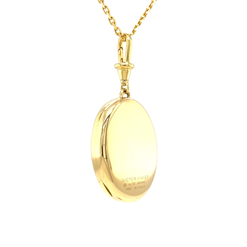 Ovaler Medaillon-Anhänger aus Gelbgold, blau lackiert mit zahlreichen kleinen Goldpunkten und mit einem tropfenförmigen blauen Edelstein in der Mitte.