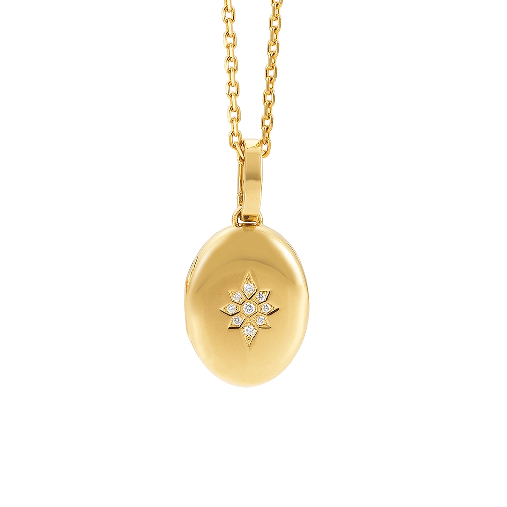 Ovaler Medaillon-Anhänger in Gelbgold mit sternförmig gefassten Brillanten.